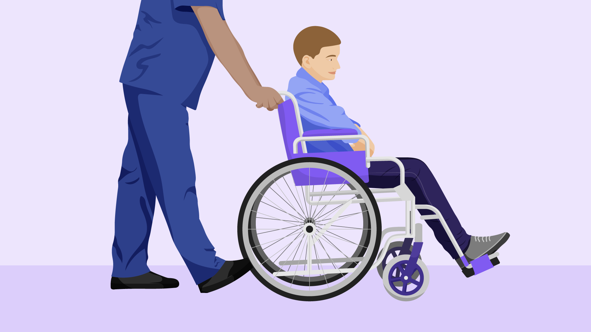 Enfermeiro empurrando uma criança na cadeira de rodas.